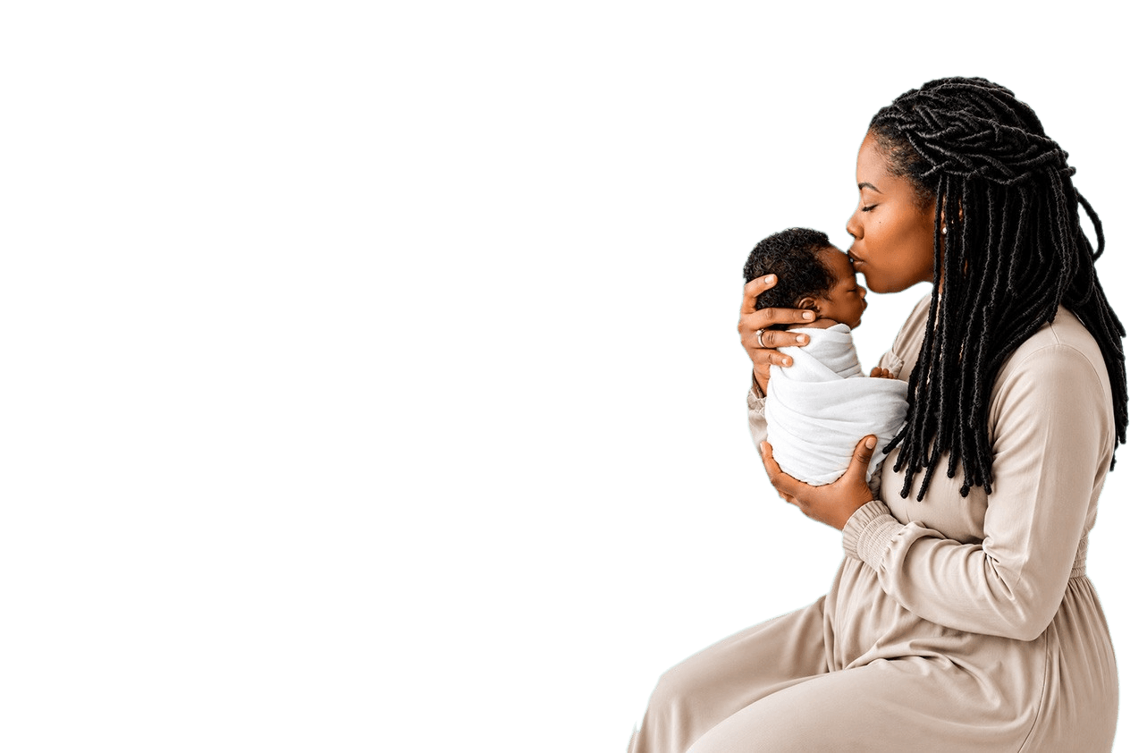 Mother kissing her newborn baby